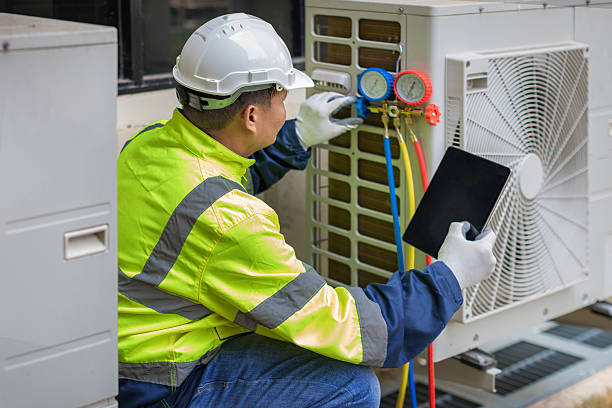 Professional Hvac technician working in Aquebogue, NY